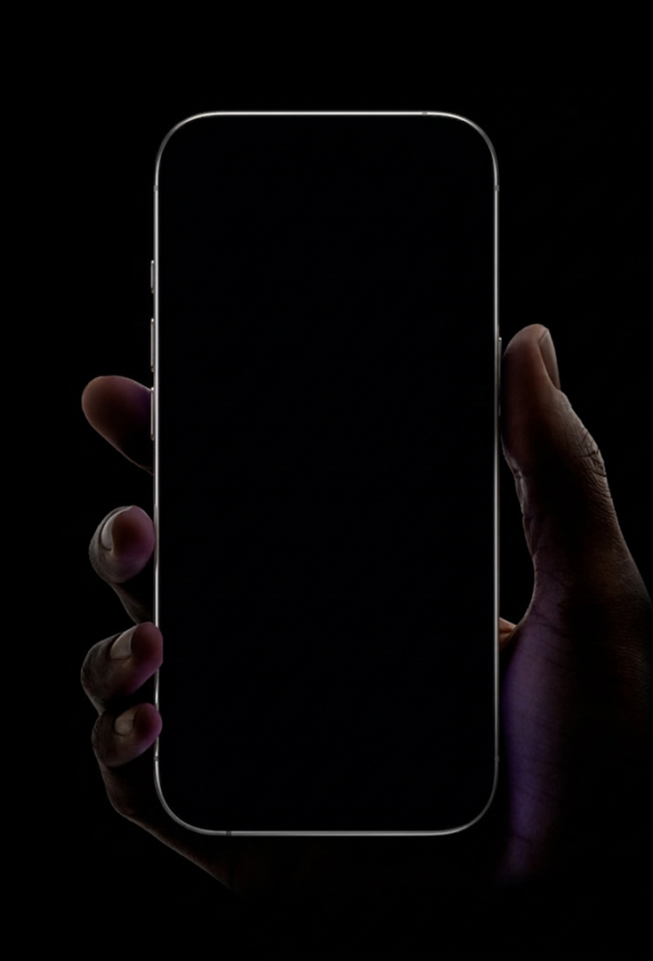 A hand holding iPhone running Trips